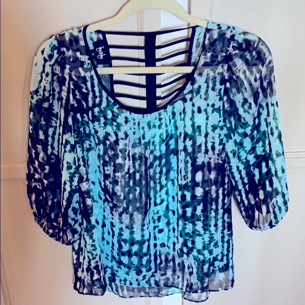 Beautiful green, aqua, and black blouse.
